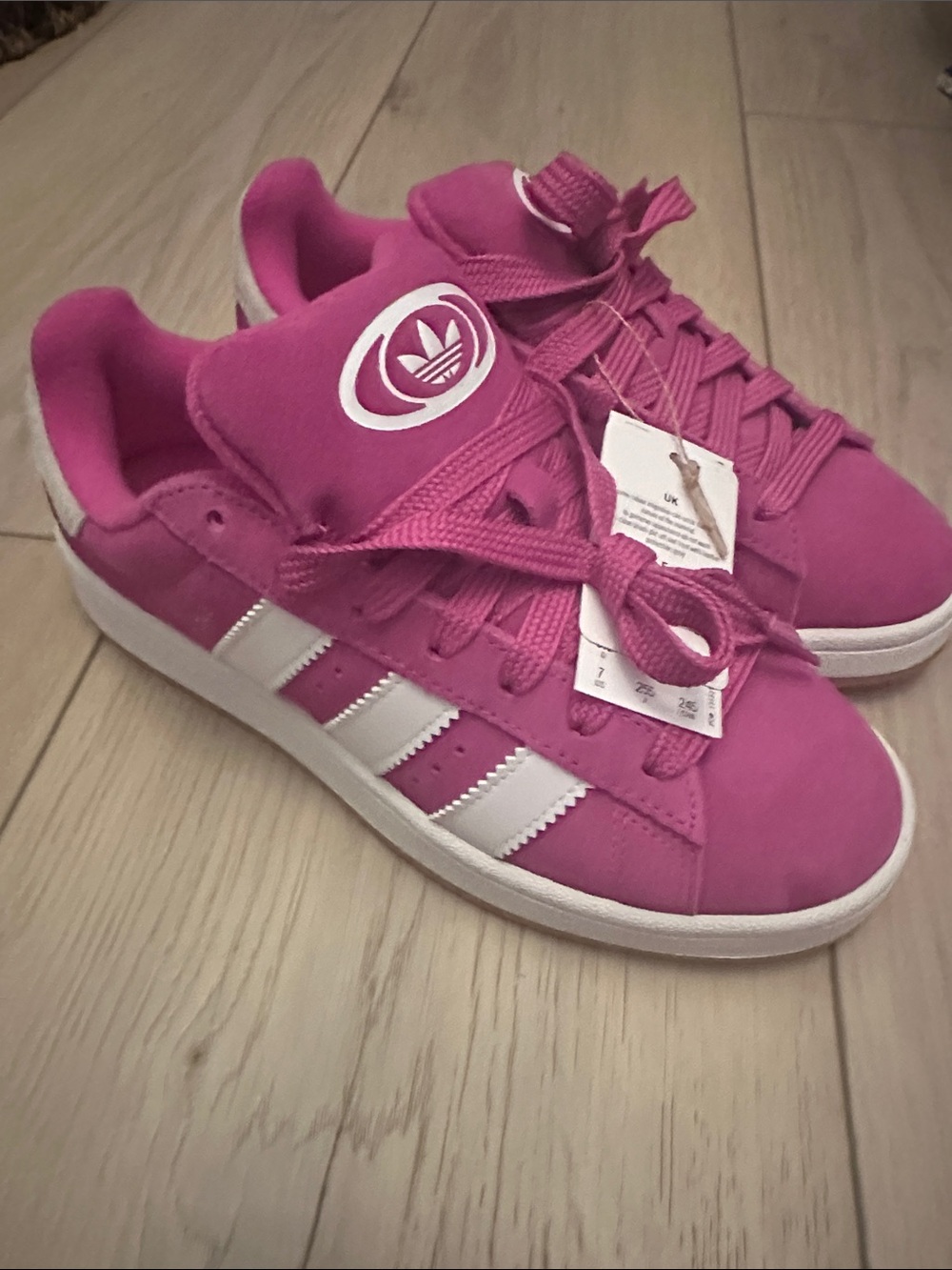 adidas Women's Pink Suede Low-Top Sneakers with White Stripes